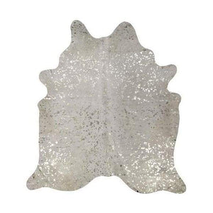 A Cowhide Rug with White and metallic Gold Pattern