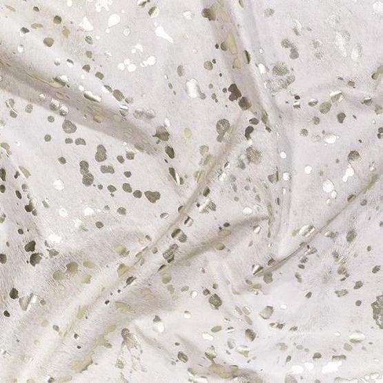 A Cowhide Rug with White and metallic Gold Pattern