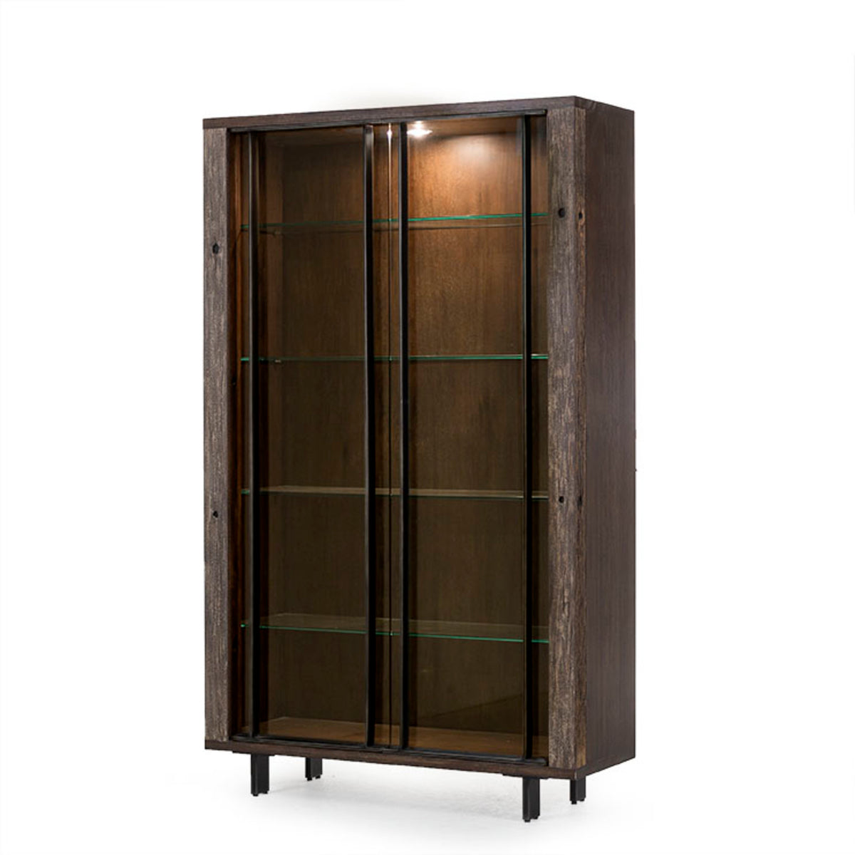 modern brown bookcase, with glass shelves and glass doors, it has a spot light on the top. diagonal view
