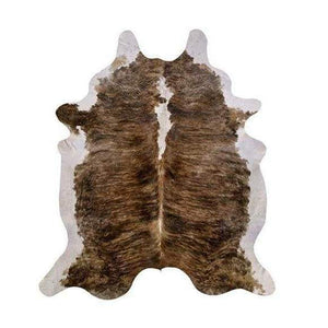 A Cowhide Rug in a Tricolor pattern
